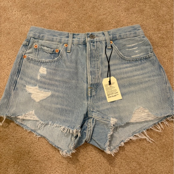 Levi's Distressed Light Blue Denim Shorts - Picture 1 of 5